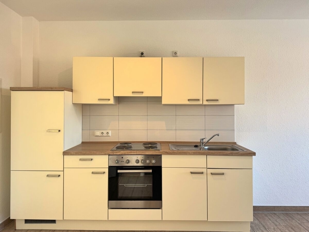 Perfekt für Singles: 2ZKB mit Einbauküche im Herzen von Wiesmoor - Photo 2