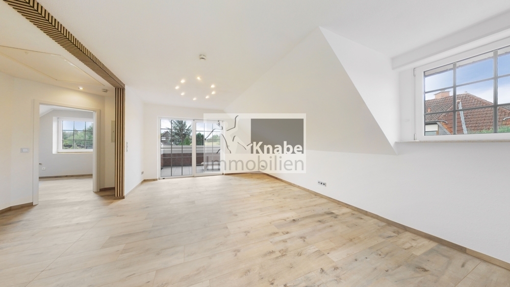 Großzügig. Lichtdurchflutet. Besonders. Dachgeschosswohnung mit Kamin! - Foto 1