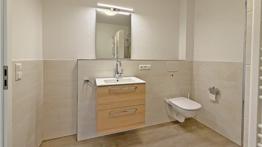 Moderne Erdgeschoss-Singlewohnung mit Terrasse und Einbauküche - Foto 4