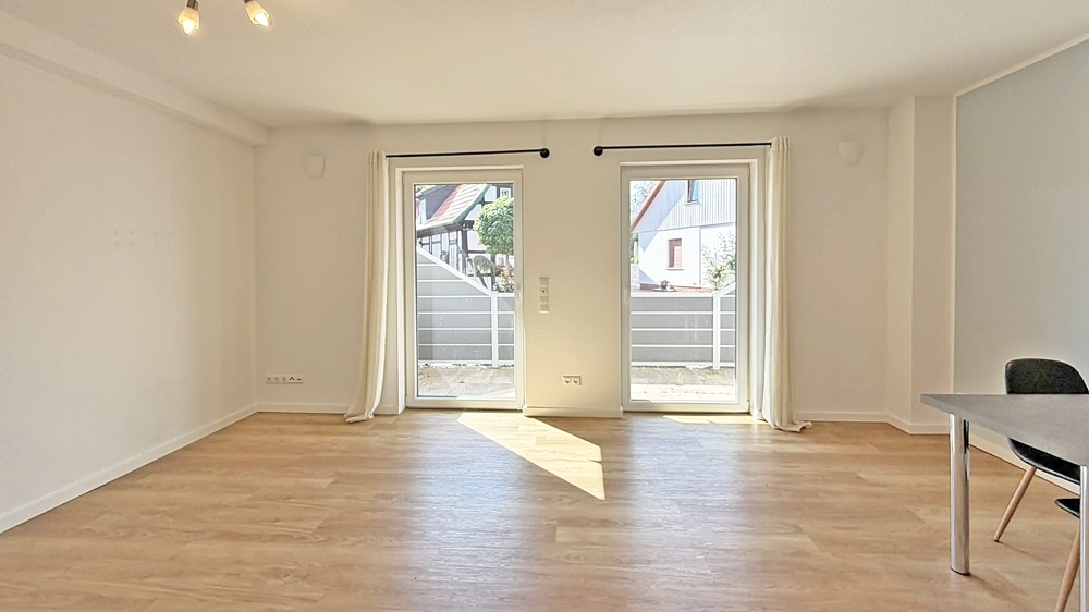 Moderne Erdgeschoss-Singlewohnung mit Terrasse und Einbauküche - Foto 1