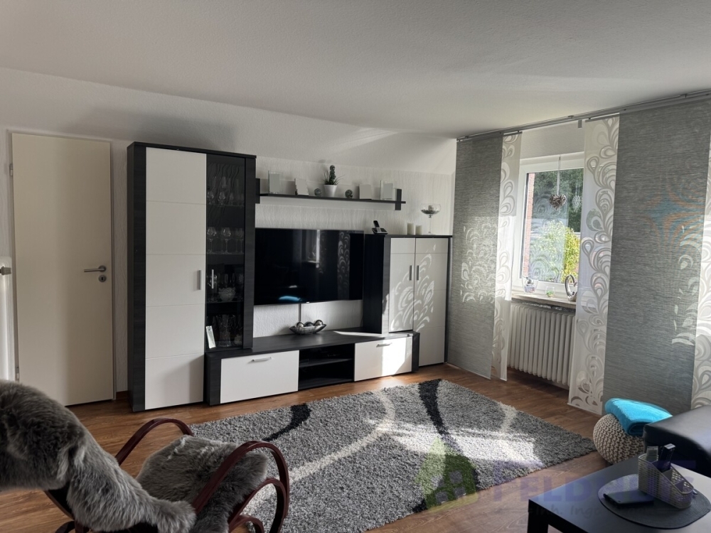 Gemütliche Oberwohnung mit Balkon in ruhiger Lage von Holtland! - Foto 2