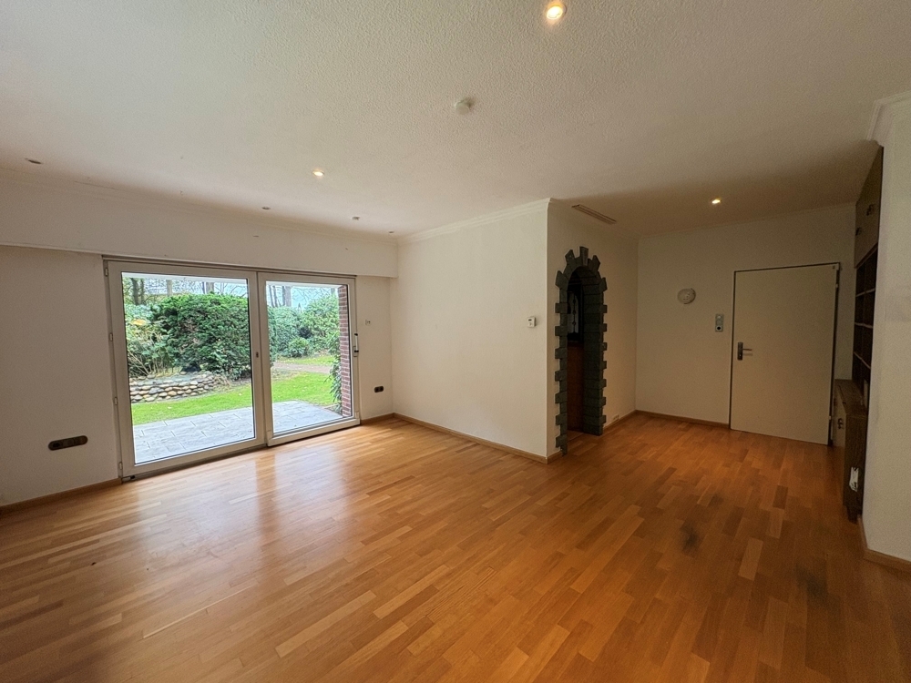 Großzügige Erdgeschosswohnung mit 5 Zimmern, Sauna, Kamin und großem Garten am Bürgerbusch - Foto 1