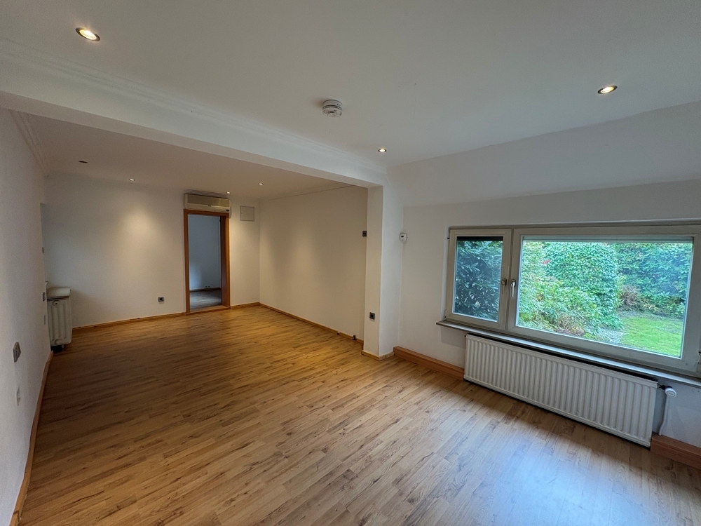 Großzügige Erdgeschosswohnung mit 5 Zimmern, Sauna, Kamin und großem Garten am Bürgerbusch - Foto 2