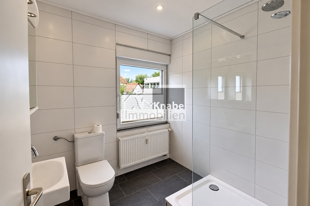 Zentral in Spenge: Wohnkomfort mit Kamin und Südbalkon! - Photo 5