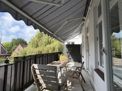 Balkon mit Markise
