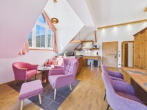 Exklusive Dachgeschosswohnung mit traumhaftem Seeblick & Wellnessbereich in Bodensdorf