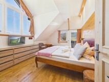 Exklusive Dachgeschosswohnung mit traumhaftem Seeblick & Wellnessbereich in Bodensdorf