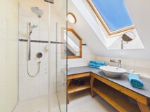 Exklusive Dachgeschosswohnung mit traumhaftem Seeblick & Wellnessbereich in Bodensdorf