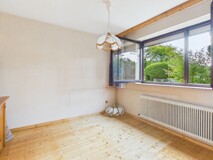 Stilvolles Zweifamilienhaus auf großzügigem Grundstück in begehrter Wohnlage von Feldkirchen – Wohnen mit Zukunftspotenzial