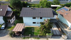 Stilvolles Zweifamilienhaus auf großzügigem Grundstück in begehrter Wohnlage von Feldkirchen – Wohnen mit Zukunftspotenzial