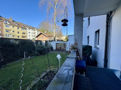 Balkon mit Zugang zum Gemeinschaftsgarten