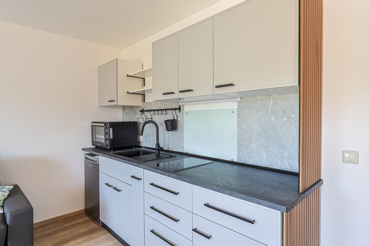 Möblierte 1-Zimmer-Wohnung mit privatem Gartenanteil - Photo 3