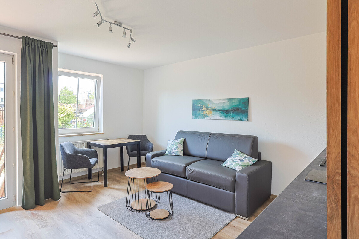 Möblierte 1-Zimmer-Wohnung mit privatem Gartenanteil - Photo 2