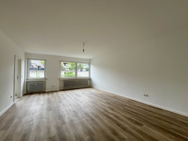 Modernisierte und frisch renovierte 3-Zimmer-Wohnung mit modernem Duschbad in zentraler Lage - Foto 4