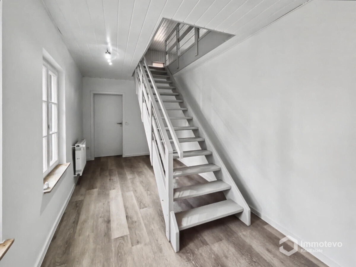 Treppenaufgang in das Dachgeschoss