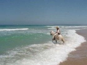 Reiten am Strand Mazagon