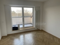 Wohnzimmer mit Zugang zur Loggia