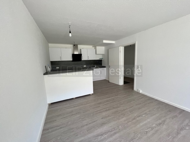 Wohnzimmer zur offenen Küche