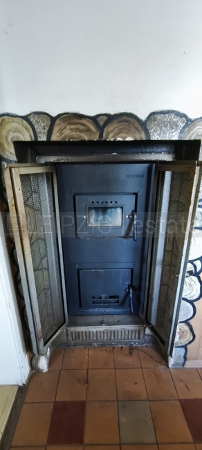 Befeuerung Kamin im Flur