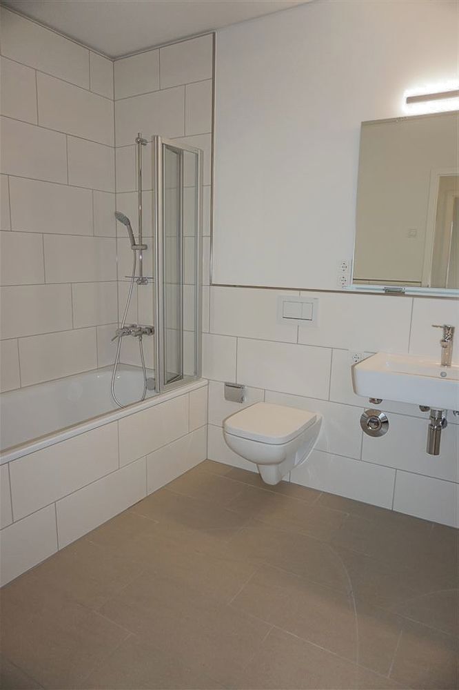 Moderne Erdgeschosswohnung mit Einbauküche und Terrasse! Mit direktem Blick auf die Mosel - Foto 4