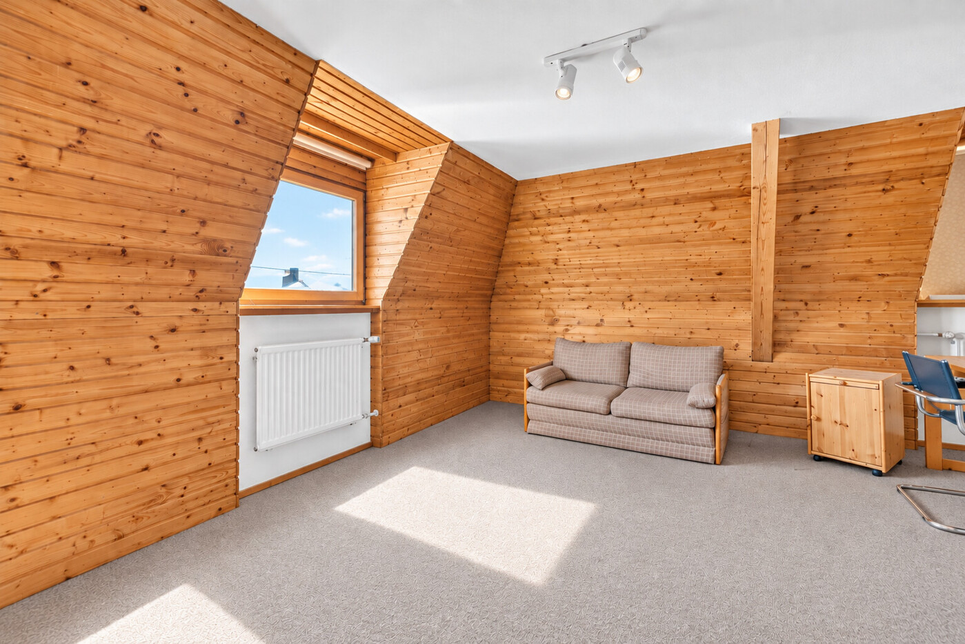 Ausgebautes Zimmer im Dachgeschoss